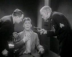 Chester Morris as Chick Williams explains he has an alibi