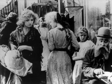 Lillian Gish as a young wife in the slums of Pig Alley