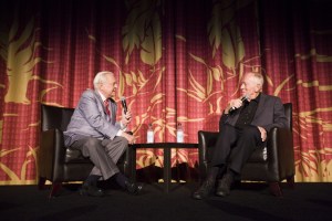 An engaged Osbourne talks to von Sydow before the screening of Three Days of the Condor