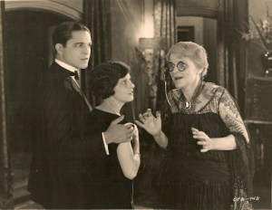May McAvoy, Malcolm McGregor and Ethel Wales in THE BEDROOM WINDOW