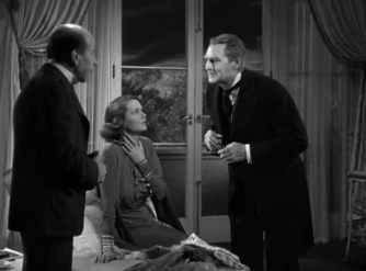 Professor Zelin confirms the doctor's suspicions as Irena looks on.