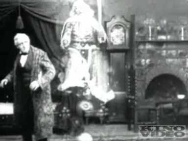 The Spirit of Christmas pays Scrooge a visit