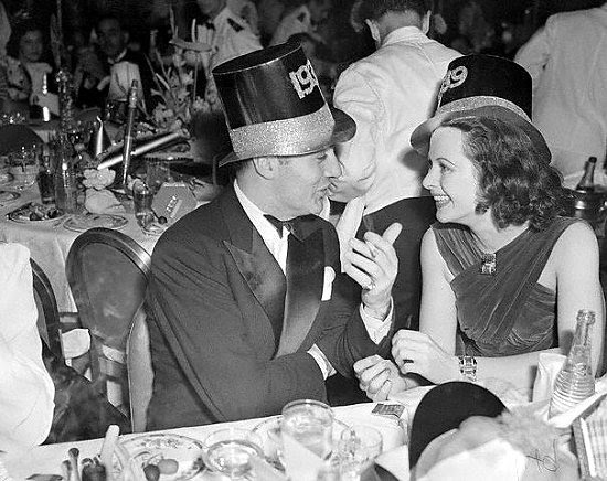 Charles Boyer and Hedy Lamarr enjoy New Year festivities