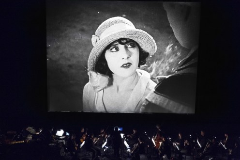 Carl Davis conducting a live performance during Why Worry?