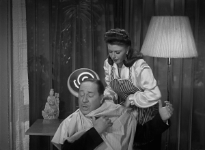 Susan trying to give Osborne a head massage before she quits for good