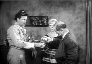 Captain Sherman, Ann and the Doctor have a drink as the danger of the killer shrews is explained