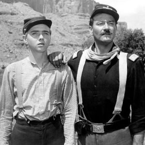 Jarman, Jr. and Wayne as father and son