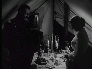 Beautifully lit scene - a tender moment between husband and wife