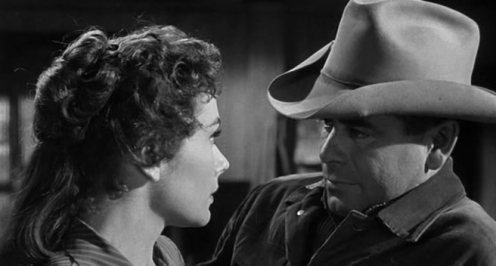 Wade with Emmy.  Ford is as effective in the romantic scenes as he is in full outlaw mode.