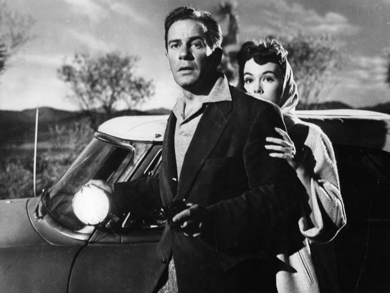 Carlson and Rush are staring toward where we can all hear the music every time the alien is close.