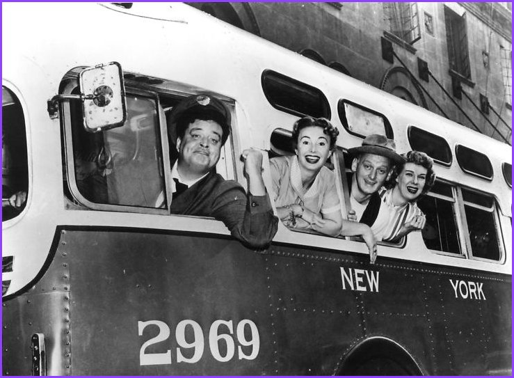 The cast of The Honeymooners in a publicity photo: Jackie Gleason as Ralph Kramden, Audrey Meadows as Alice Kramden, Carney as Ed Norton and Joyce Randolph as Trixie Norton