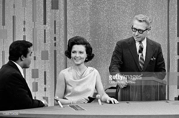 Betty White and Allan Ludden with a contestant on Password in 1967